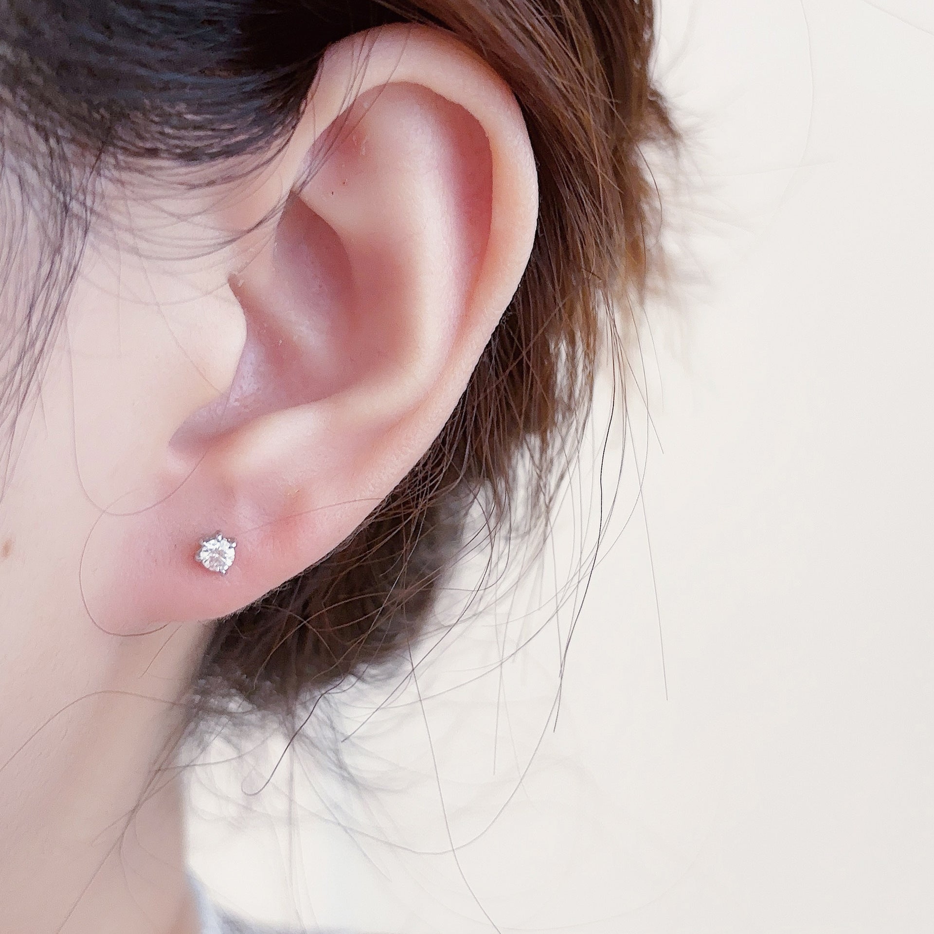 Flashing Zircon Ear Studs